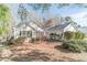 Charming one-story home with green shutters and mature landscaping in a suburban setting at 3005 Summit View Ct, Snellville, GA 30078