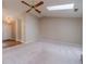 Inviting living room features a vaulted ceiling, skylight, and stylish ceiling fan at 3005 Summit View Ct, Snellville, GA 30078