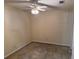 Spacious bedroom with ceiling fan and carpet flooring, ready for personalization at 302 Chattahoochee Way, Woodstock, GA 30188