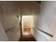 View of the staircase leading to the basement area at 302 Chattahoochee Way, Woodstock, GA 30188