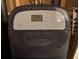 Ecowater water softener in basement, displaying a digital clock at 2:33 at 302 Chattahoochee Way, Woodstock, GA 30188