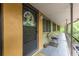 A cozy balcony with a small table and chair set, perfect for relaxation at 520 Park Se Ave # 10, Atlanta, GA 30312