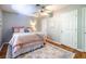 Bedroom with hardwood floors, neutral walls, and ceiling fan at 520 Park Se Ave # 10, Atlanta, GA 30312