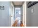 Hallway with hardwood floors and neutral paint, leading to the bedrooms and bathroom at 520 Park Se Ave # 10, Atlanta, GA 30312