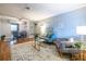 Open-concept living room and dining area with hardwood floors and neutral decor at 520 Park Se Ave # 10, Atlanta, GA 30312