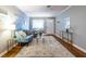 Cozy living room featuring hardwood floors, a comfortable sofa, and ample natural light at 520 Park Se Ave # 10, Atlanta, GA 30312