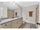 Bathroom with granite countertop, ample cabinet space, and tile floors at 95 Summerlyn Dr, Hiram, GA 30141