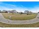 Expansive front lawn of a residential property with mature trees in a serene neighborhood setting at 95 Summerlyn Dr, Hiram, GA 30141