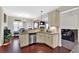 Cozy kitchenette with granite counters, stainless steel appliances, and access to living room at 95 Summerlyn Dr, Hiram, GA 30141