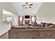 Spacious living room with a stone fireplace, vaulted ceiling, and open layout at 95 Summerlyn Dr, Hiram, GA 30141
