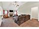 Inviting living room with a stone fireplace, vaulted ceiling, and comfortable seating at 95 Summerlyn Dr, Hiram, GA 30141