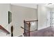 Staircase with dark wood trim and carpeted steps at 95 Summerlyn Dr, Hiram, GA 30141