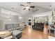 Spacious living room features vaulted ceiling, hardwood floors, and stylish furniture at 104 Puckett Creek Dr, Canton, GA 30114