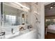 Luxurious bathroom featuring double sinks and glass enclosed shower at 1409 Northgate Dr, Villa Rica, GA 30180