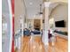 Bright, open living room boasts hardwood floors, stone fireplace and vaulted ceilings at 1409 Northgate Dr, Villa Rica, GA 30180
