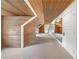 Spacious attic with wood paneled ceiling, natural light, and plenty of storage space at 235 The Prado N, Atlanta, GA 30309