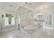 Luxurious bathroom featuring a modern soaking tub, glass shower, and marble finishes at 235 The Prado N, Atlanta, GA 30309