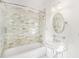 Bathroom with white tile, decorative sink, and chrome fixtures at 235 The Prado N, Atlanta, GA 30309