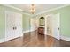 Bedroom with hardwood floors, ample closet space, and an adjacent bathroom at 235 The Prado N, Atlanta, GA 30309