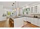 Bright and open kitchen with an island bar and stainless steel appliances at 235 The Prado N, Atlanta, GA 30309