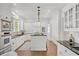 Spacious gourmet kitchen with a large center island and stainless steel appliances at 235 The Prado N, Atlanta, GA 30309