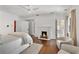 Spacious primary bedroom featuring a fireplace and sitting area at 235 The Prado N, Atlanta, GA 30309