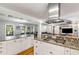 Spacious kitchen with granite countertops, stainless appliances, and an open layout perfect for entertaining guests at 3113 Octavia Pl, Atlanta, GA 30340
