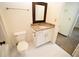 Cozy bathroom with white tile floors and light countertops, plus plenty of storage at 1075 Peachtree Ne Walk # A519, Atlanta, GA 30309