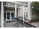 Apartment community entrance with stairs, a door, and attractive landscaping at 1075 Peachtree Ne Walk # A519, Atlanta, GA 30309