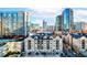 Apartment complex with city skyline views, parking, pool and balconies in a modern urban setting at 1075 Peachtree Ne Walk # A519, Atlanta, GA 30309