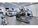 Modern gym featuring treadmills, elliptical machines, and plenty of equipment for a complete workout at 1075 Peachtree Ne Walk # A519, Atlanta, GA 30309