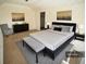 Elegant bedroom with a luxurious bed, stylish decor, and ample space for relaxation at 1075 Peachtree Ne Walk # A519, Atlanta, GA 30309