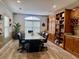 Spacious meeting room with a large table, comfortable chairs, and built-in bookshelves at 1075 Peachtree Ne Walk # A519, Atlanta, GA 30309