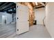 Unfinished basement area showcasing open layout with gray vinyl floors and neutral paint at 2923 Glenhaven Sw Ct, Conyers, GA 30094