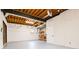 Spacious unfinished basement with exposed beams and concrete floors, great for storage at 2923 Glenhaven Sw Ct, Conyers, GA 30094