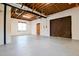 Unfinished basement with concrete floors and exposed ceiling, offering plenty of space at 2923 Glenhaven Sw Ct, Conyers, GA 30094