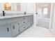 Bathroom vanity with granite countertops and tile flooring at 2923 Glenhaven Sw Ct, Conyers, GA 30094