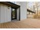 Wooden deck and doorway to the home's exterior with natural lighting at 2923 Glenhaven Sw Ct, Conyers, GA 30094