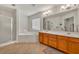 Bathroom featuring a large vanity with double sinks, a soaking tub, and a shower at 3285 Pebble Ridge Ln, Buford, GA 30519