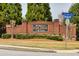 Community entrance sign reading 'The Orchards - Park Ridge - The Enclave' at 3285 Pebble Ridge Ln, Buford, GA 30519