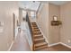 Welcoming foyer with staircase, hardwood floors, and a decorative wreath above the front door at 3285 Pebble Ridge Ln, Buford, GA 30519