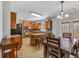 Modern kitchen with wood cabinets, granite countertops, stainless steel appliances, and a center island at 3285 Pebble Ridge Ln, Buford, GA 30519
