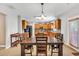 Open kitchen featuring granite countertops, wood cabinets and stainless steel appliances at 3285 Pebble Ridge Ln, Buford, GA 30519