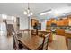 Stylish eat-in kitchen with wood cabinetry, an island, and modern appliances at 3285 Pebble Ridge Ln, Buford, GA 30519