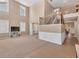 Spacious living room with high ceilings, large windows, and carpeted floors at 3285 Pebble Ridge Ln, Buford, GA 30519