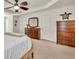 Comfortable main bedroom featuring neutral walls, a ceiling fan, and a cozy, carpeted floor at 3285 Pebble Ridge Ln, Buford, GA 30519