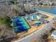 Community amenities include tennis courts, swimming pools, playground, and clubhouse by the lake at 465 Hunt River Way, Suwanee, GA 30024