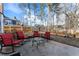 Relaxing backyard patio with comfortable seating, ideal for outdoor entertaining and relaxation at 465 Hunt River Way, Suwanee, GA 30024