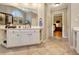 Bathroom with a large vanity and view of the bedroom through the doorway at 155 Woodcreek Ln, Fayetteville, GA 30215