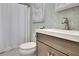 Bathroom showcasing a stylish vanity and shower with patterned wallpaper, creating a relaxing atmosphere at 155 Woodcreek Ln, Fayetteville, GA 30215